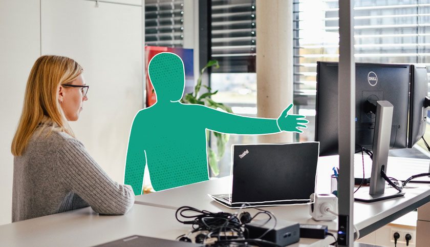 Stylised person in front of monitor